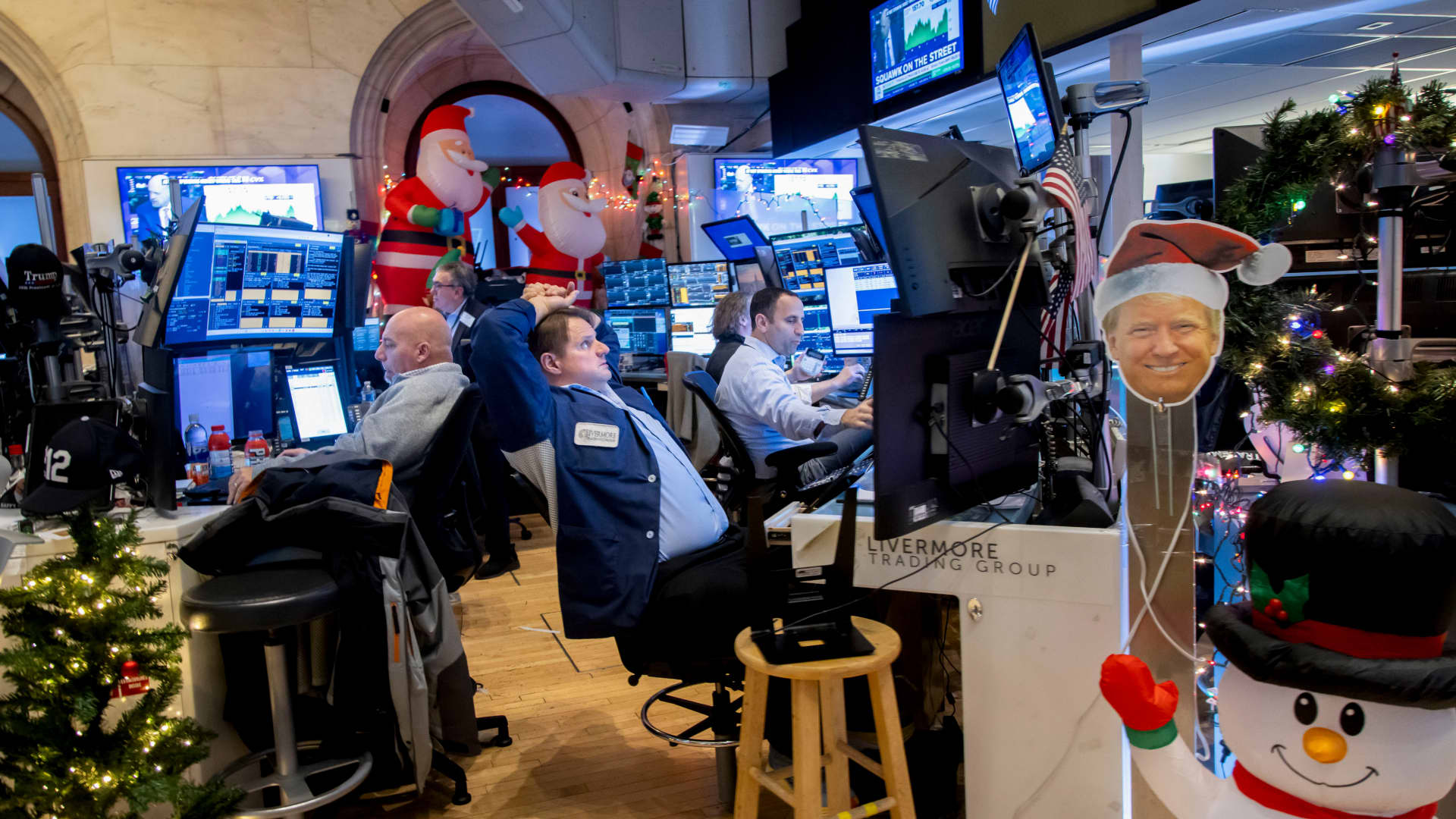 Holiday-thinned markets cheered by strong Wall Street finish