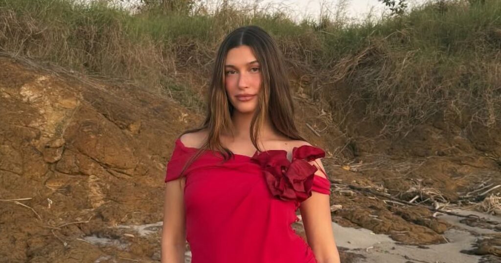 Hailey Bieber Is Radiant in Red on Beach Trip With Justin Bieber