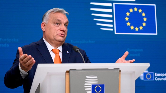 Viktor Orbán gestures while speaking at a press conference