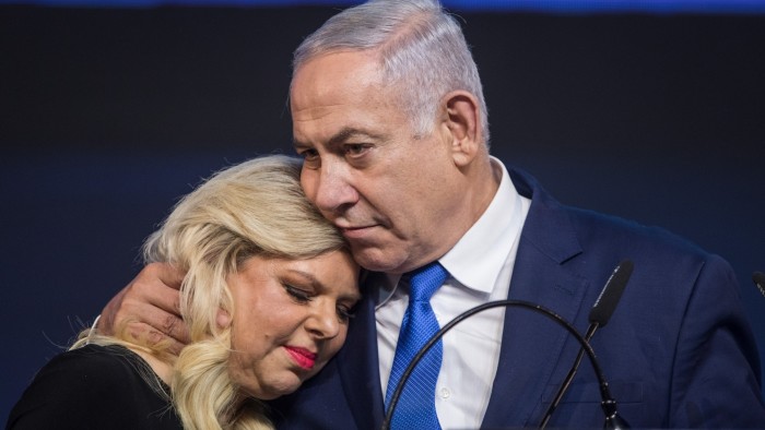 Benjamin Netanyahu hugs his wife, Sara