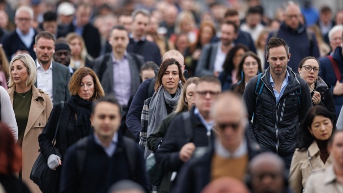 Commuters cross London Bridge