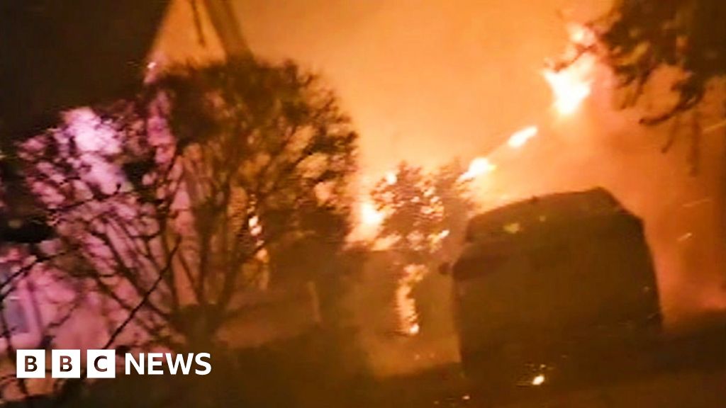 Moment man's saved from burning LA home