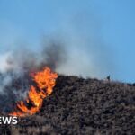 New fires erupt in southern California ahead of Trump visit