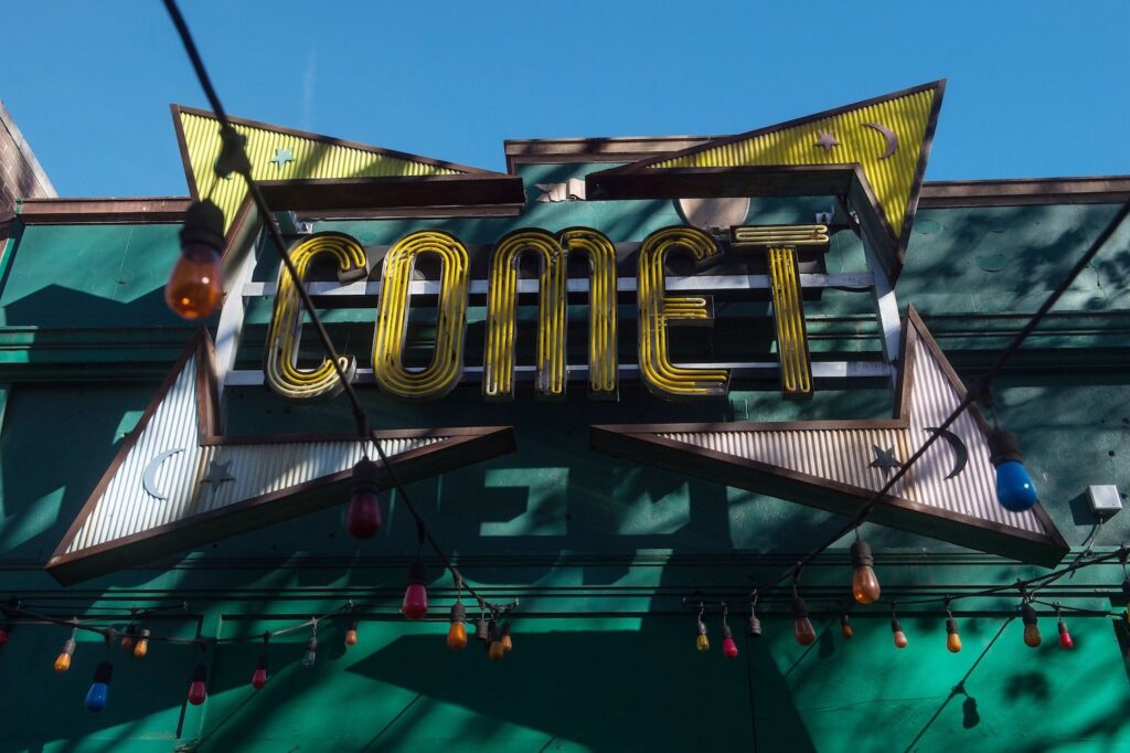 The sign for the Comet Ping Pong restaurant is seen in Washingon, DC, on December 5, 2016.