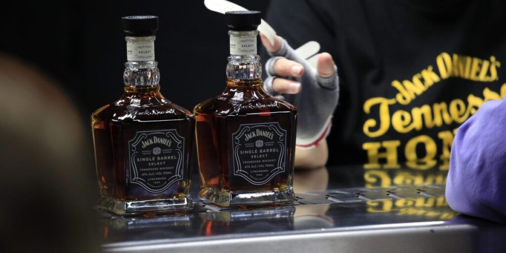 Jack Daniel’s parent Brown-Forman is cutting 12% of its workforce and closing its hometown barrel-making plant