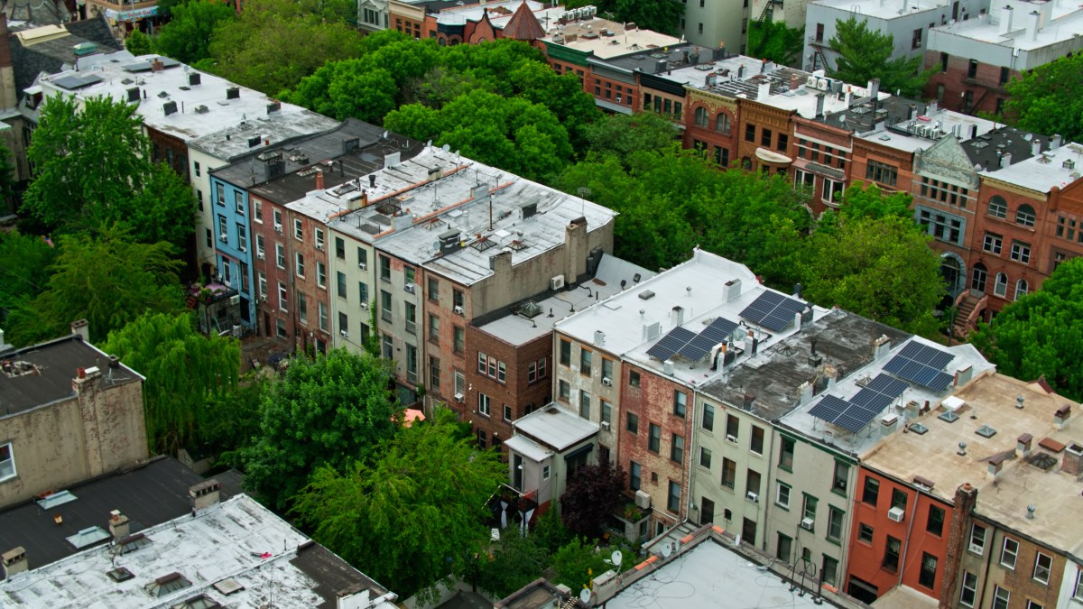 Aerial shot of Brooklyn, New York city on an overcast day in summer, taken from over the Bedford-Stuvesant neighborhood.