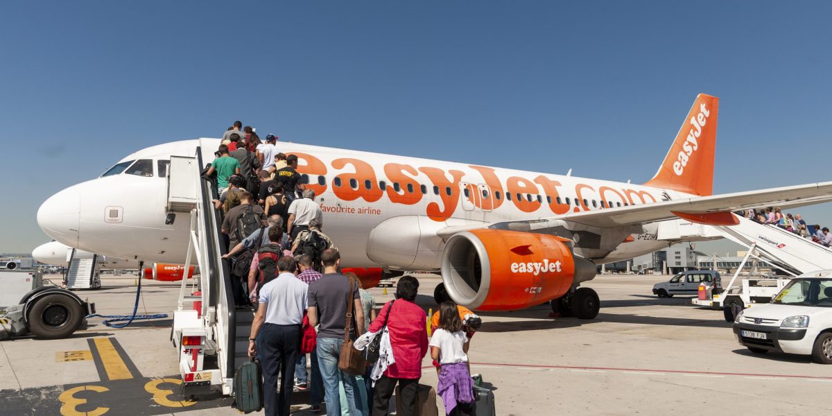 EasyJet halves losses amid lower fuel costs and package holiday boost. ‘We have one million more customers already booked’ says CEO