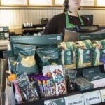 Starbucks worker says baristas have a ‘panic button’ behind the counter, but it won’t be enough to quell angry customers after open-door policy reversal