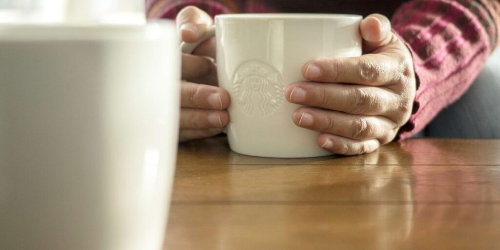 Starbucks is banking on ‘mug hugs’ to get customers to hang around in store longer