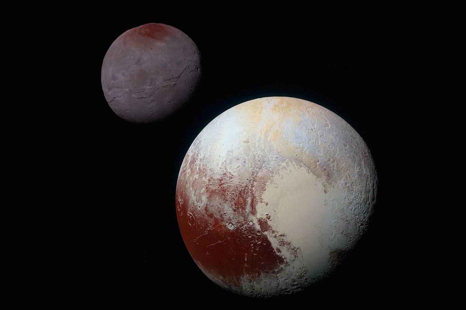 A composite image of Pluto and its moon Charon.