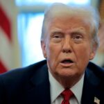 President Donald Trump talks to reporters in the Oval Office at the White House on January 30, 2025 in Washington, DC