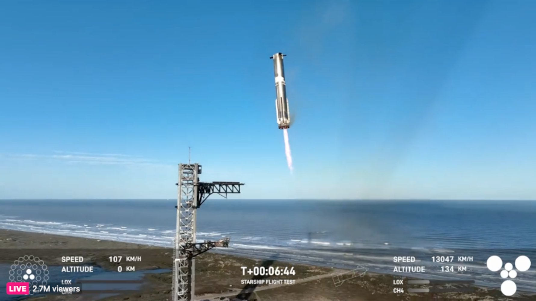 Starship's Super Heavy booster moments before its landing at the Boca Chica launch tower, nicknamed "Mechazilla."