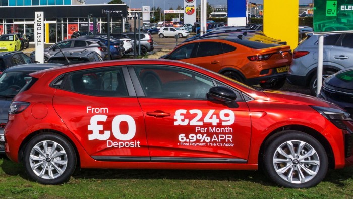 Cars for sale on showroom forecourt