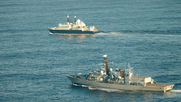 HMS Somerset flanking Russian ship Yantar near UK waters, in an undated photo issued by the Royal Navy