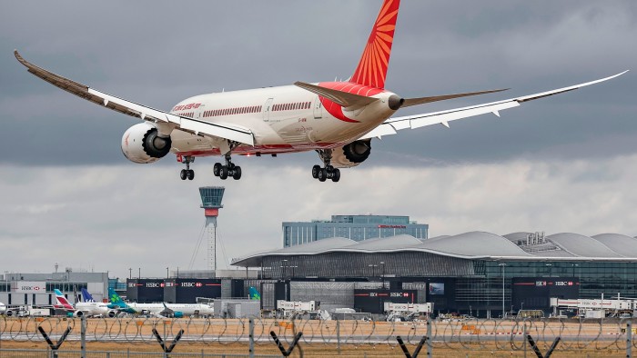 An aircraft lands at Heathrow airport