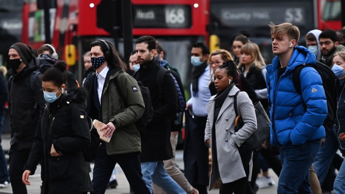 Shoppers walking on a London street