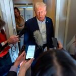 Donald Trump speaking to reporters on Air Force One on Saturday