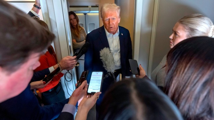 Donald Trump speaking to reporters on Air Force One on Saturday