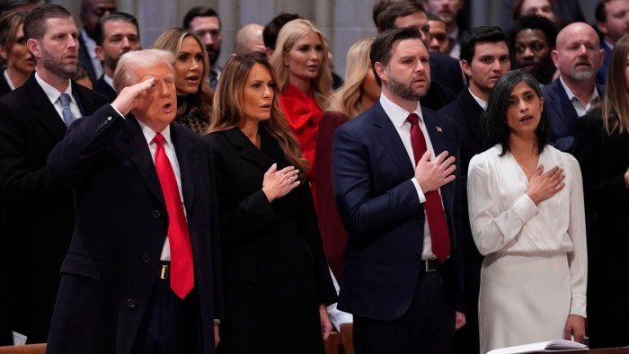 President Donald Trump, from left, salutes alongside first lady Melania Trump, Vice President JD Vance and his wife Usha Vance during the national prayer service at the Washington National Cathedral