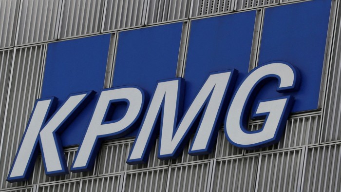 KPMG’s logo at offices in Canary Wharf, London