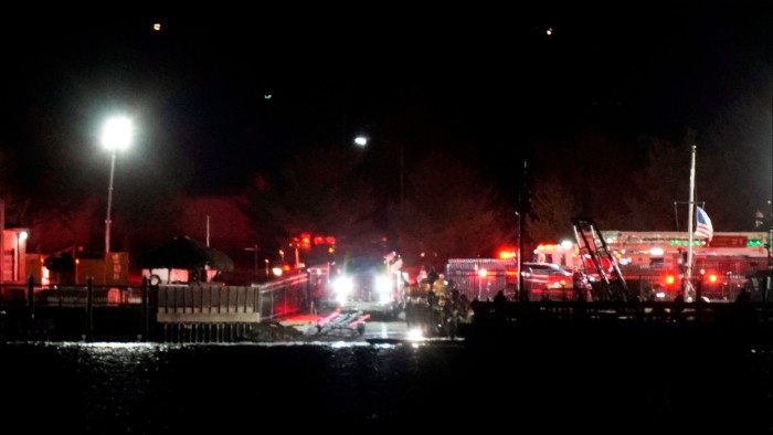 Emergency responders near Ronald Reagan airport after the crash late on Wednesday