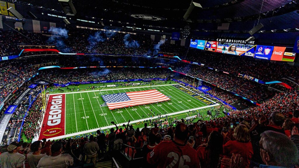 College football fans launch into 'U-S-A!' chant after moment of silence for victims of New Orleans attack