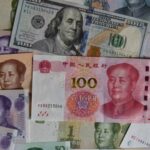 Asian currencies weaken as U.S. dollar strengthens after Trump levies tariffs