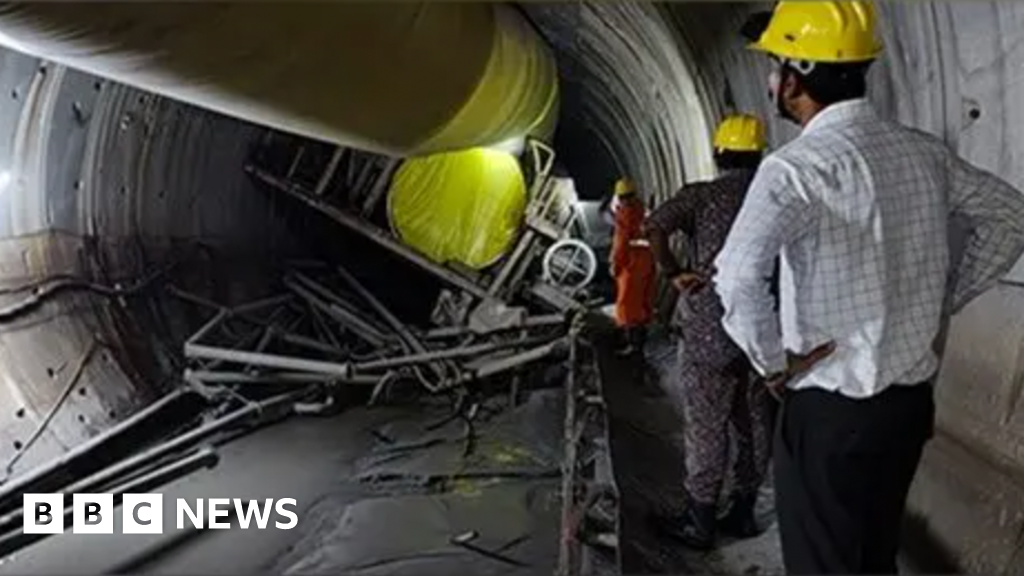 Race to save eight Indian workers trapped inside tunnel