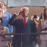 Trump receives raucous reception as he salutes during Super Bowl LIX national anthem