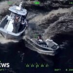 Moment unconscious man is rescued from out of control boat