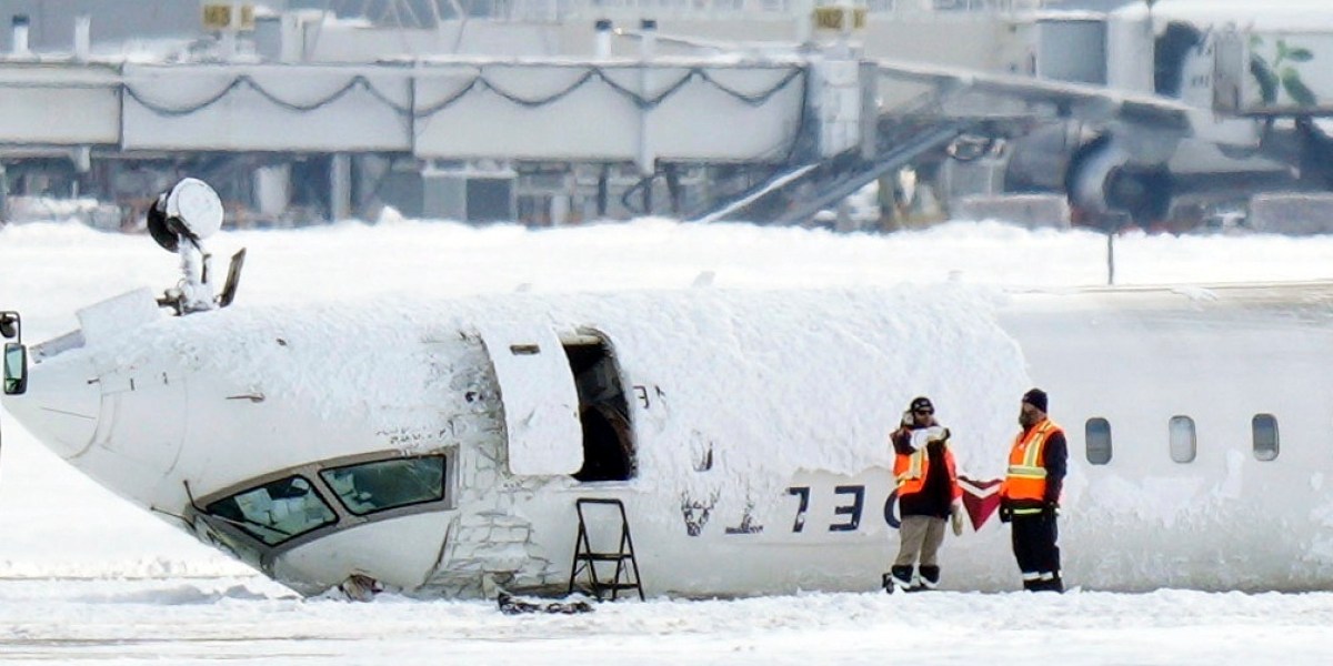 Investigators to probe why Delta jet burst into flames and flipped after landing ‘so hard that the right main [landing] gear collapsed’