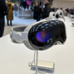 Apple Vision Pro on a stand in an Apple Store. The AVP Gets New AI Features with Apple Intelligence