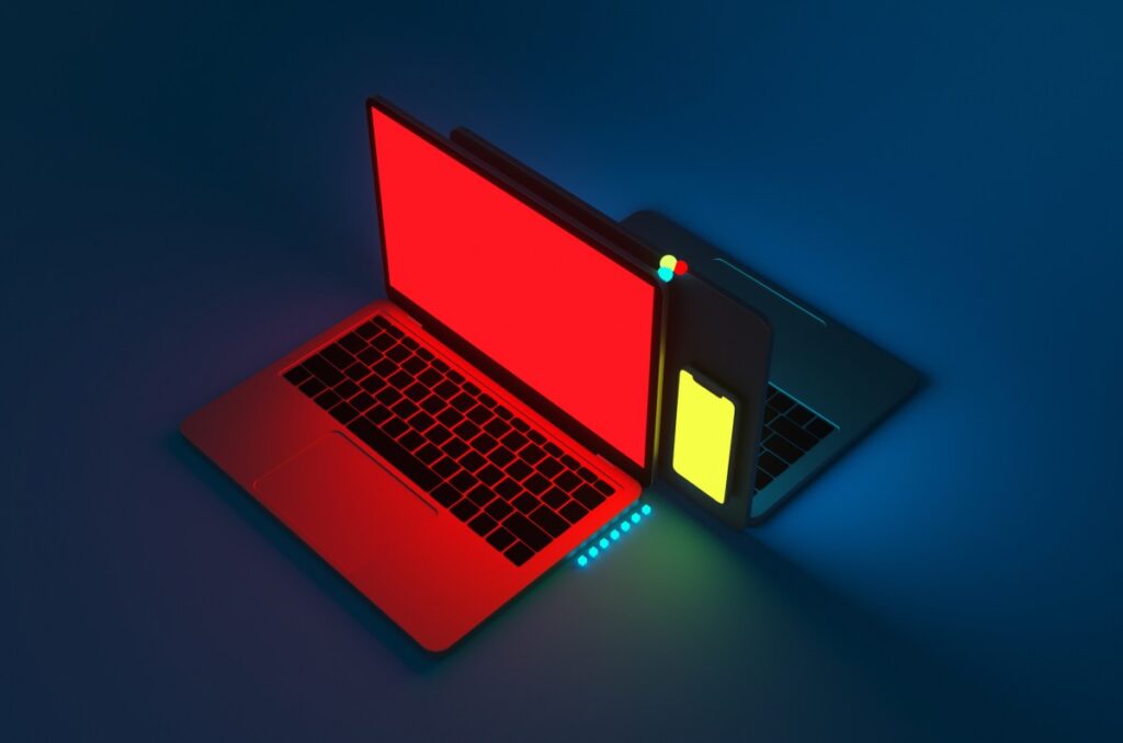 A red laptop on a blue background.