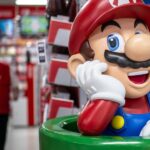 Nintendo cuts profit forecast after weak Switch sales as the video game company teases its next device