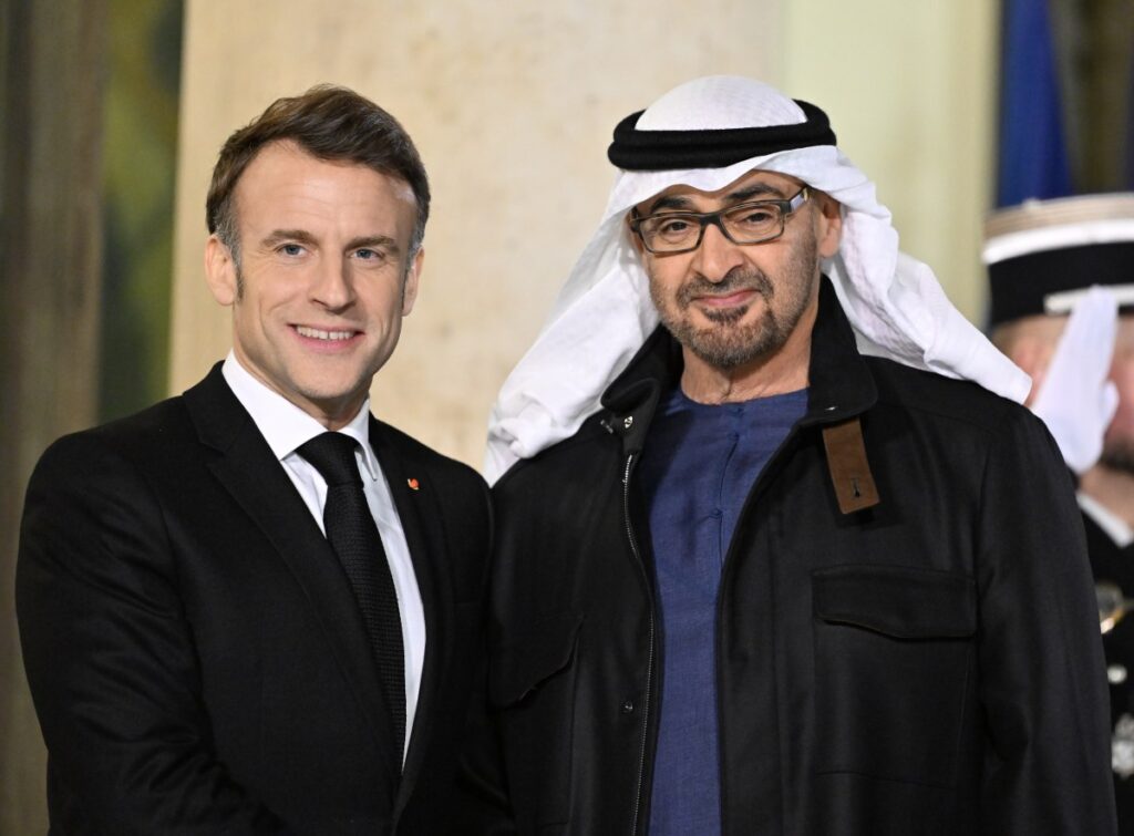 French President Emmanuel Macron (L) and President of the United Arab Emirates Sheikh Mohammed bin Zayed Al Nahyan (R) pose to photographers before their work dinner at the Elysee Palace in Paris, France on February 06, 2025.