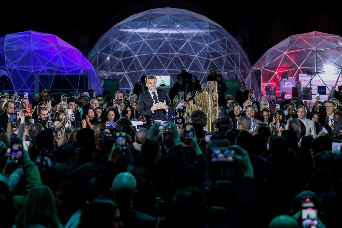 TOPSHOT - France's President Emmanuel Macron (C) delivers a speech during a closing event for the first day of the Artificial Intelligence (AI) Action Summit, at the Grand Palais, in Paris, on February 10, 2025. (Photo by Ludovic MARIN / AFP) (Photo by LUDOVIC MARIN/AFP via Getty Images)