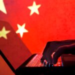 Cybercriminal, hacker China flag background.