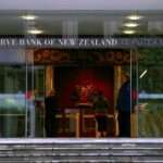 NZ central bank cuts rates by 50bps, flags more easing ahead