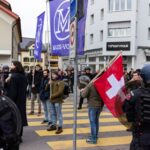 Hundreds protest at Swiss home of German far-right leader