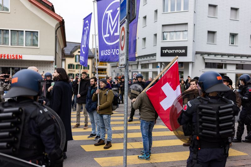 Hundreds protest at Swiss home of German far-right leader