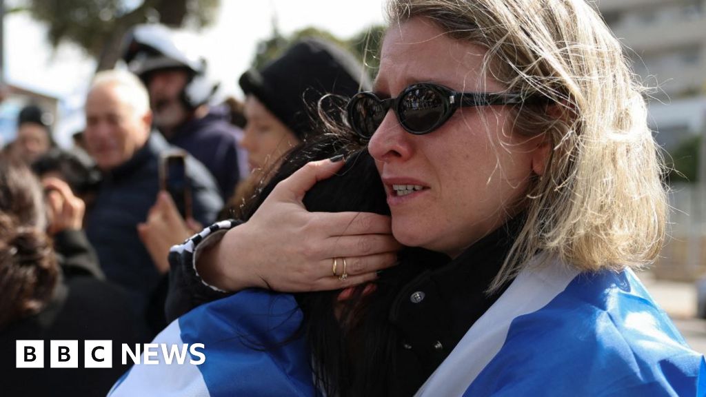 Return of bodies marks day of anguish for Israel