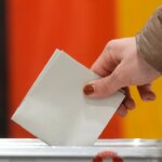 German election exit polls suggest conservative candidate pulling ahead