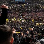 A vehicle carries the coffins of former Hizbollah leaders Hassan Nasrallah and Hashem Safieddine in Camille Chamoun Sports City Stadium