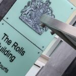 A sign for the Rolls building at London’s High Court