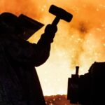 An employee in protective clothing at work in the blast furnace at Tata Steel’s works in Port Talbot, south Wales