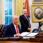 US President Donald Trump speaks to reporters in the Oval Office of the White House on Monday