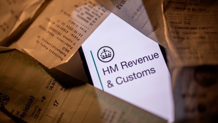 HMRC document surrounded by receipts