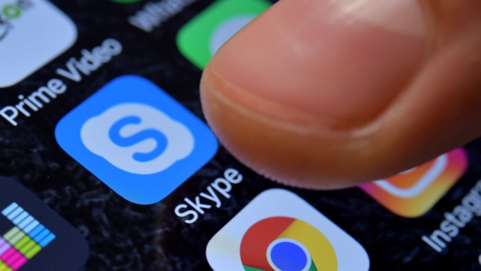 A close-up image showing the Skype app on an iPhone