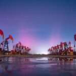 Aurora borealis shines over oil derricks in Daqing, China