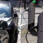 Electric vehicles plugged in at a Source charging point